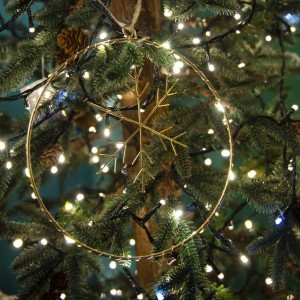 Χριστουγεννιάτικο στρογγυλό μεταλλικό στολίδι με χιονονιφάδα με λαμπάκια led θερμου φωτός 20 εκ