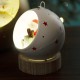 Χριστουγεννιάτικη επιτραπέζια διακοσμητική μπάλα σε ξύλινη βάση με φως και Άγιο Βασίλη 15 εκ