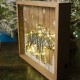 Χριστουγεννιάτικο κρεμαστό διακοσμητικό τοίχου με τάρανδο φωτισμένο από λαμπάκια led θερμού φωτός 25 εκ