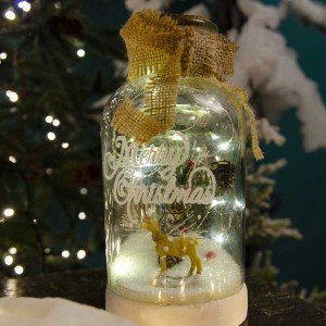 Χριστουγεννιάτικο γυάλινο επιτραπέζιο διακοσμητικό μπουκάλι με φελό με τάρανδο χιόνι και 10 λαμπάκια led 20 εκ
