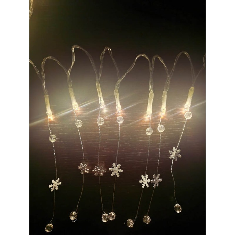 20 LED λαμπάκια με χιονονιφάδες διάφανο καλώδιο  μπαταρίας και θερμό λευκό φως 10 μέτρα