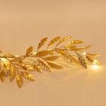 Διακοσμητική γιρλάντα με φύλλα ελιάς σε χρυσή απόχρωση με 30 ενσωματωμένα LED λαμπάκια 150 εκ Διακοσμητική γιρλάντα με φύλλα ελιάς σε χρυσή απόχρωση με 30 ενσωματωμένα LED λαμπάκια 150 εκ