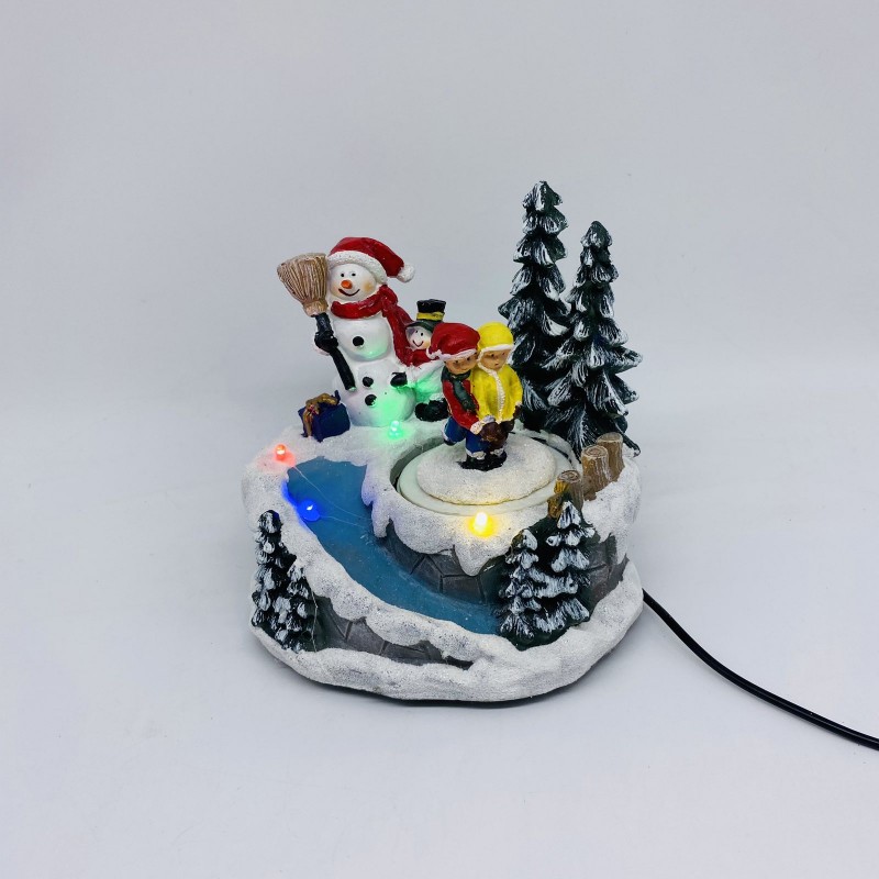 Χριστουγεννιάτικο διακοσμητικό σκηνικό με παιδάκια και χιονάνθρωπο με ενσωματωμένο φωτισμό κίνηση και μουσική 14x13x14 εκ