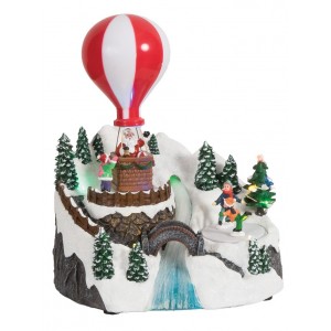 Χριστουγεννιάτικο διακοσμητικό χιονισμένο σκηνικό με παιδάκια και Άγιο Βασίλη με ενσωματωμένη κίνηση και μουσική 22x19x26 εκ