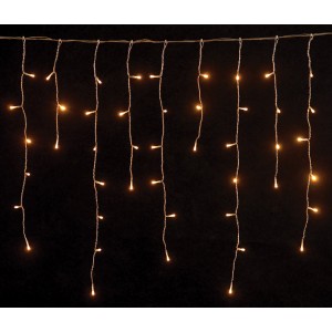 Χριστουγεννιάτικη ασύμμετρη κουρτίνα 600 LED επεκτεινόμενη με διάφανο καλώδιο και θερμό λευκό φως IP44 300x35 εκ