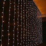 500 Led λαμπάκια κουρτίνα με διάφανο επεκτεινόμενο καλώδιο και soft white φως 3x3μ